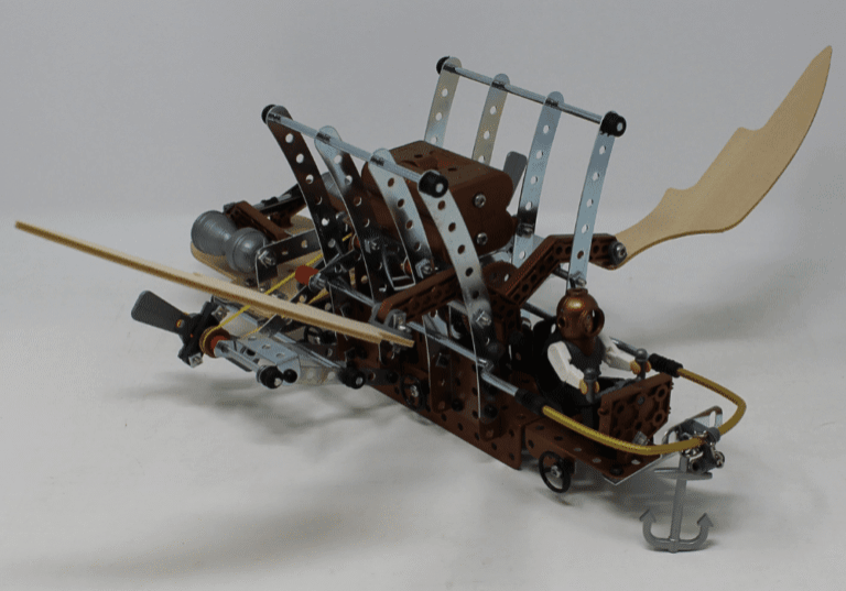 Metal toy flying machine.